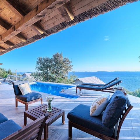 Enjoy views of the Adriatic Sea from the poolside