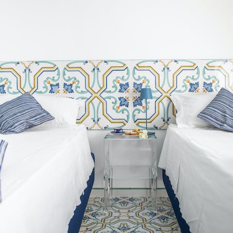 Admire the hand-painted tiles throughout the villa