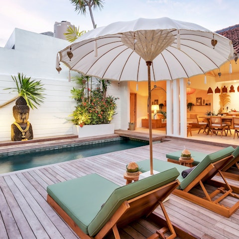 Embrace total relaxation while lounging by the pool