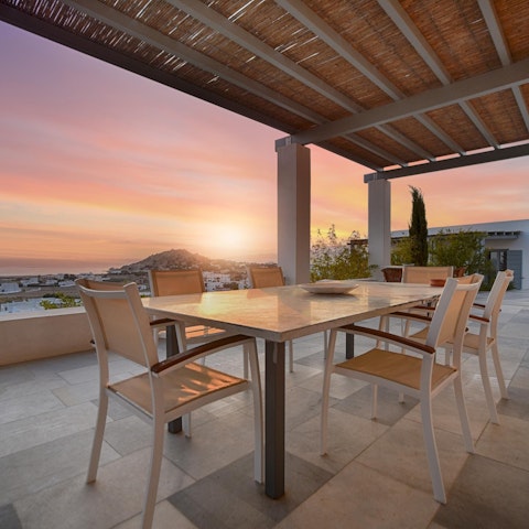 Host group meals on the terrace as the sun sets