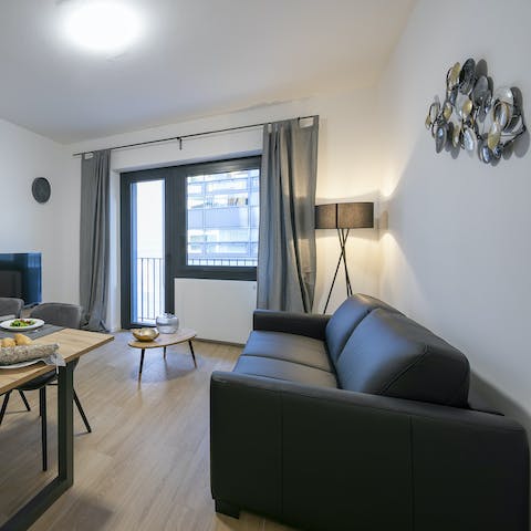 Curl up on the comfy leather couch in the lull before dinner