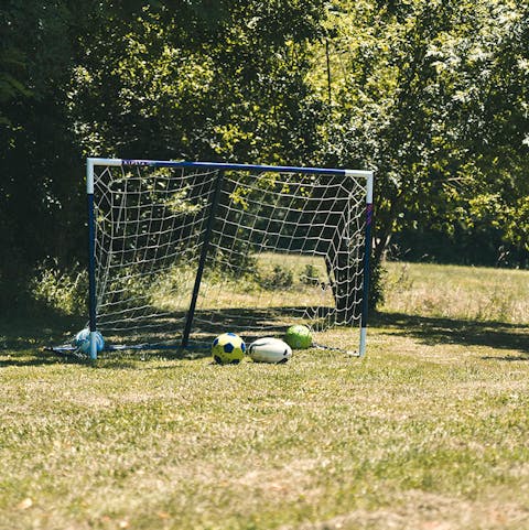 Play a friendly game of football in the vast garden