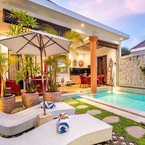 Splash around in the private pool or soak up the sun