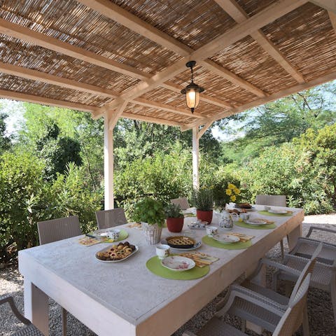 Enjoy an alfresco breakfast under the shade of the pergola