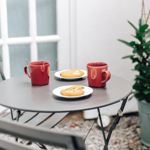 Savour your morning coffee on the private patio on a sunny day