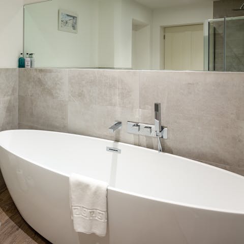 Soak in the freestanding tub with a glass of pinot noir