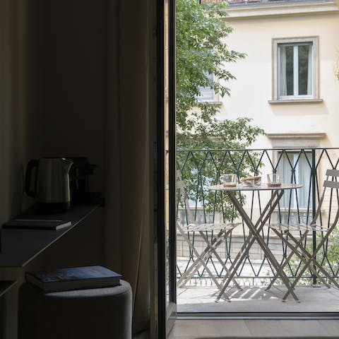 Sip your morning coffee on the private balcony