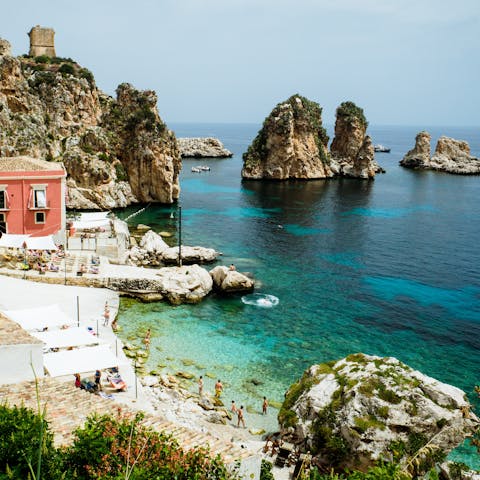 Take a plunge into the local turquoise waters with their unique rock formations