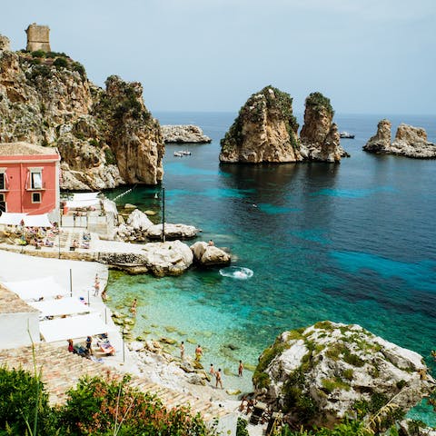Take a plunge into the local turquoise waters with their unique rock formations