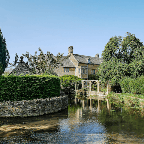 Stay in the beautiful village of Bourton-on-the-Water – after a wander, head to the local pub for lunch, a one-minute walk away