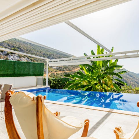 Spend hours unwinding by the infinity pool