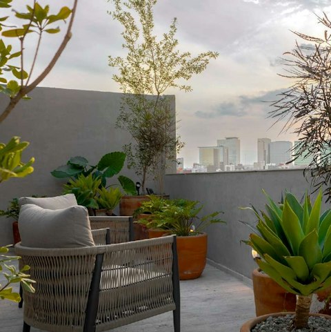 Savour the cityscape as you relax on the shared rooftop terrace