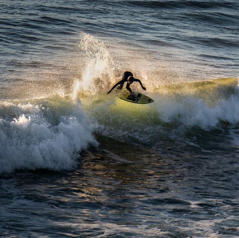 Ride the waves at Surfrider Beach – just a five-minute drive away