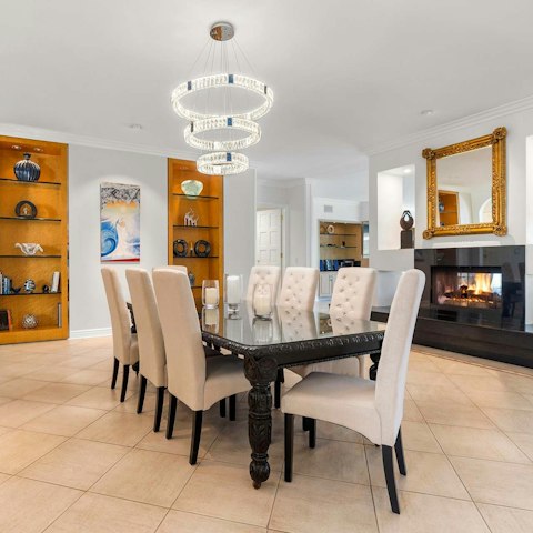 Gather in the dining room for a sociable meal with your guests
