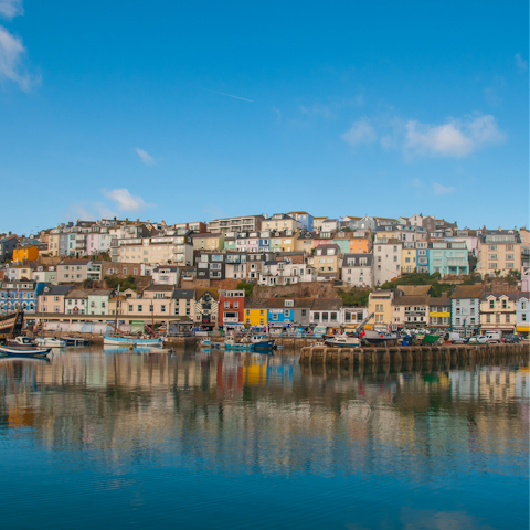 Enjoy a stroll by Brixham Harbour, a seven-minute drive away