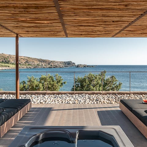 Watch the sun go down below the horizon from the comfort of the Jacuzzi