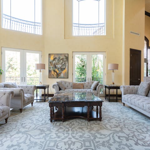 Relax in the homely yet grand living room