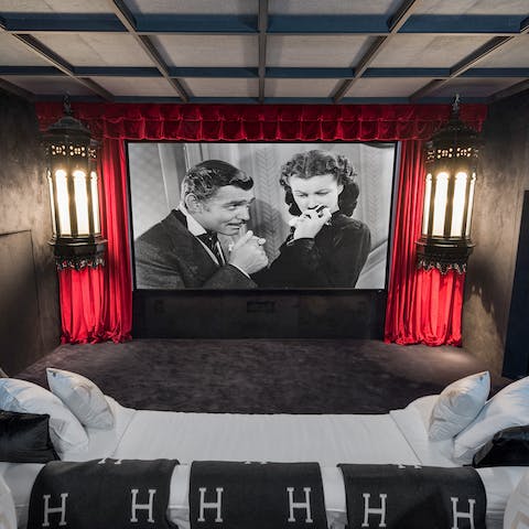 Host a movie night in the private screening room