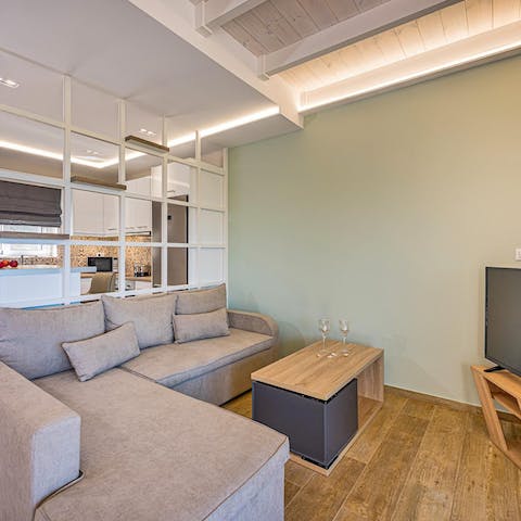 Cosy up for movie nights in the living room, following a day of exploring Zakynthos