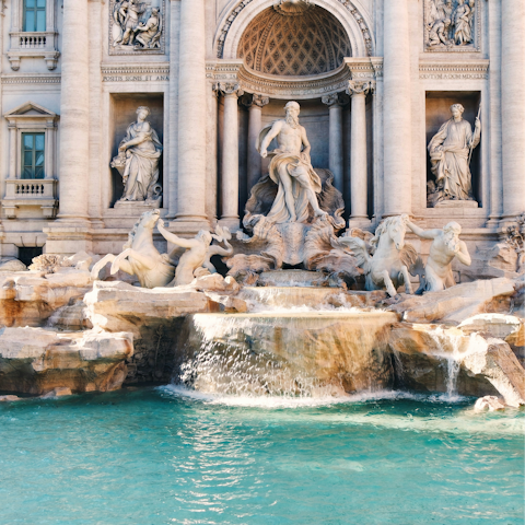 Cross the Ponte Sisto and walk thirty minutes to the Trevi Fountain