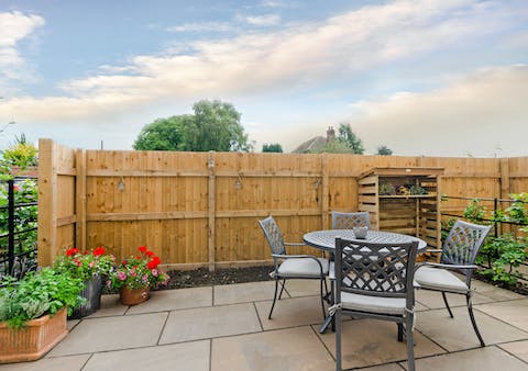 Dine alfresco on the private patio on a warm summer's day