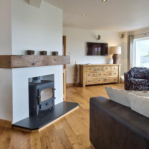 Cosy up next to the fireplace with a good book or a glass of wine