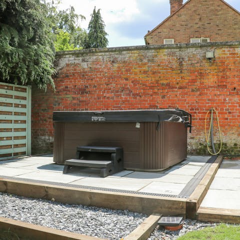 Fire up the hot tub and relax among the bubbles