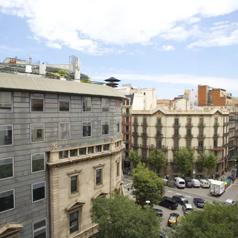 Poke your head out of your Juliet balcony to soak in the beautiful sights of Barcelona