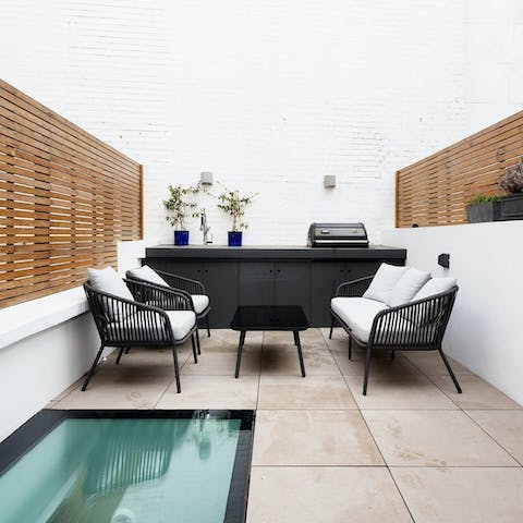 Gather on the terrace for cocktails as the sun goes down