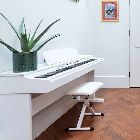 Tickle the ivories and play a tune on the white piano