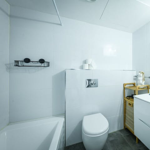 Treat yourself to a leisurely soak in the apartment's bathtub
