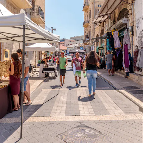 Wander the characteristic streets of Old Jaffa, half an hour's bus ride away
