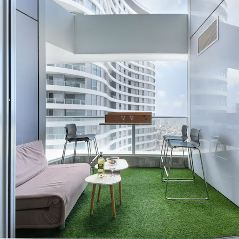 Get a breath of fresh air during the summer months out on the balcony