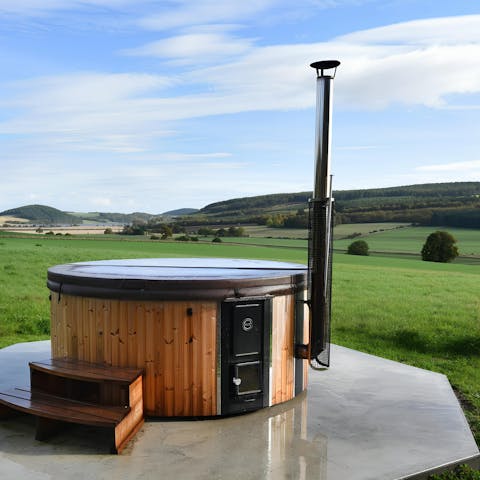 Take in the beautiful countryside views from the hot tub