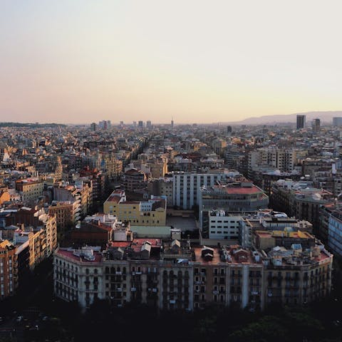 Explore the stylish restaurants and boutiques of Eixample, a thirty-minute walk or fifteen-minute ride away