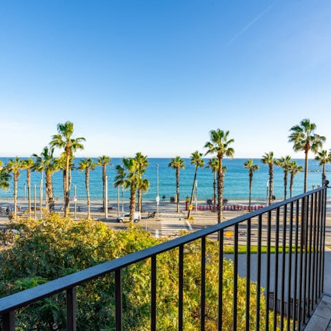 Take in the vistas over Barceloneta Beach from your balcony