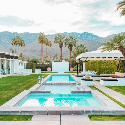 Cool off in the pool with mountain views behind