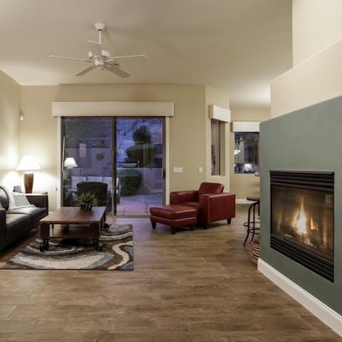 Switch on the gas fireplace and get cosy