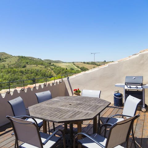 Head up to the second-floor terrace and enjoy a feast fresh off the barbecue
