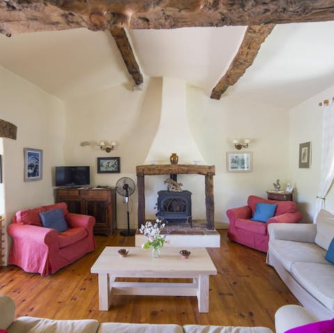 Snuggle up on the sofas with the wood burning stoves crackling away