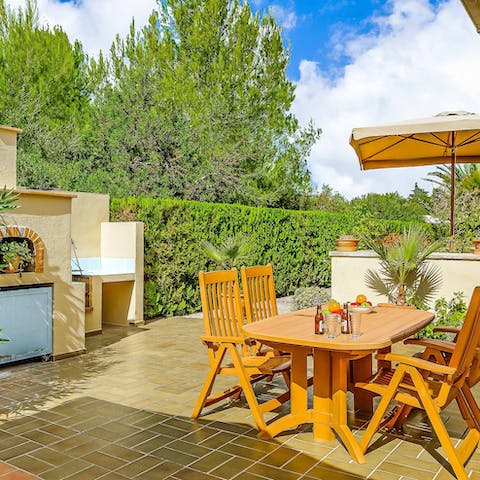 Savour delicious alfresco feasts and jugs of sangria out on the patio