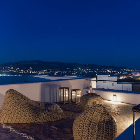 Sip drinks under the stars on the home's rooftop terrace