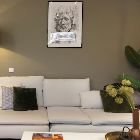 Sit back on the plump sofa with a glass of cold Kydonitsa