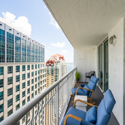 Sip cocktails on the balcony and admire bay views