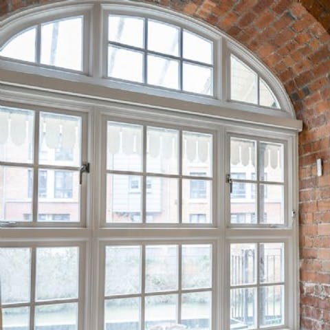 Admire original architecture features, like sash windows and exposed brickwork