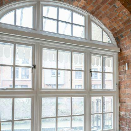 Admire original architecture features, like sash windows and exposed brickwork