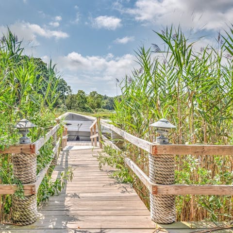 Make the most of your 50 feet of water frontage and private boat dock