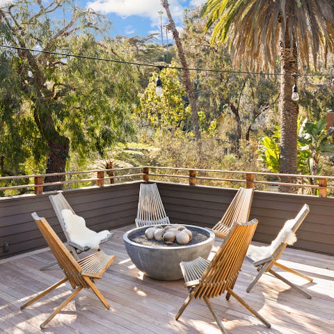 Warm up around the fire pit on a chilly day