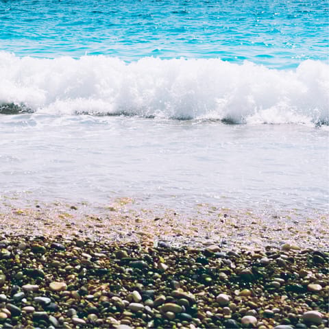 Spend the day on Plaka Beach, a short walk away