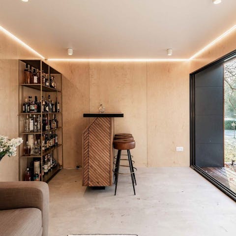 Enjoy a nightcap in the exterior bar, with its glass sliding doors